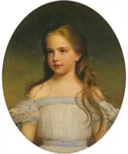 Oval portrait painting of a young girl with long, light brown hair, wearing an off-the-shoulder white dress with light blue accents and standing in front of a soft, dark background.